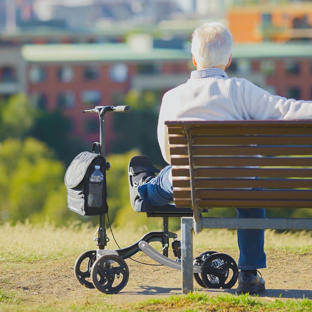 Hlpmedical EQUIPMED knee scooter walker with disc brake, suspension, and storage bag for broken leg, ankle, or foot mobility support.