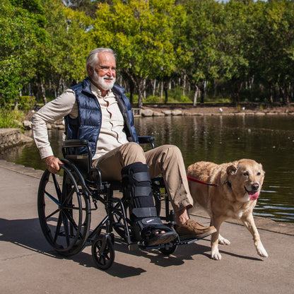 Black EQUIPMED portable folding wheelchair with 24-inch wheels, retractable armrests, suitable for up to 136kg capacity.