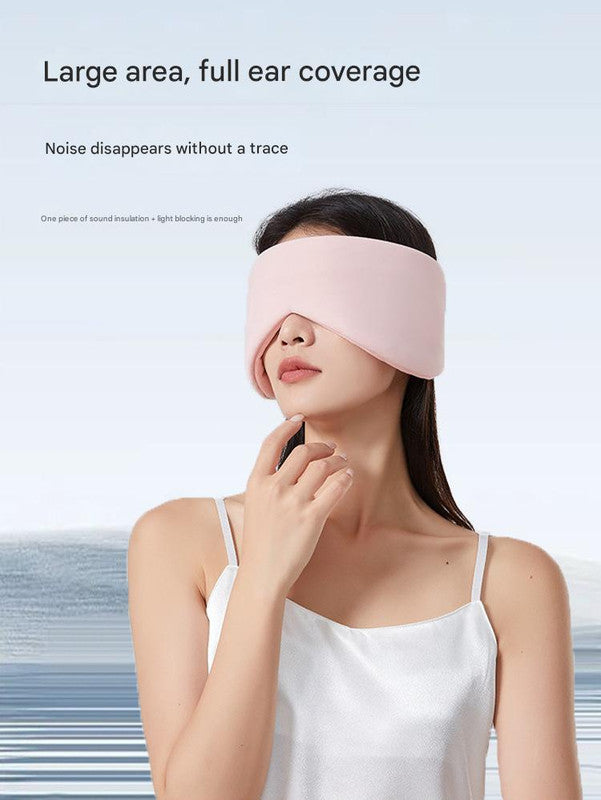 Grey reversible all-season sleep mask from Hlpmedical with cooling and warming features, sound-muffling ear covers, for better sleep.