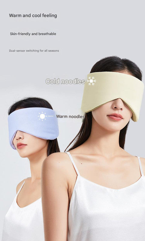 Grey reversible all-season sleep mask by Hlpmedical with cooling, warming features and sound-muffling ear covers for better sleep.