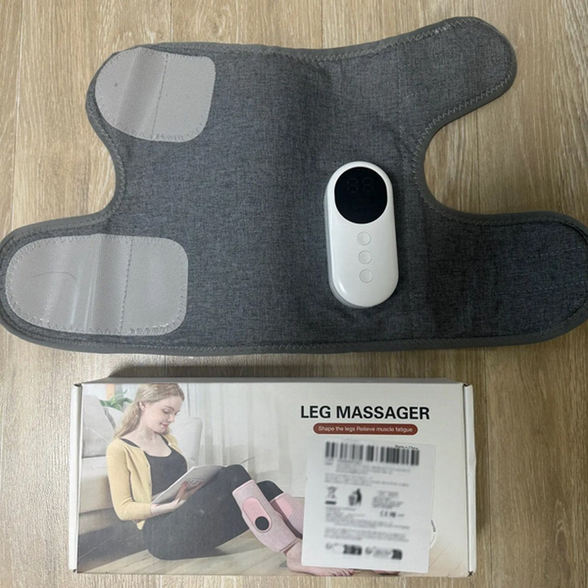 Hlpmedical cordless grey leg massager with air compression for calf and leg pain relief and adjustable intensity.