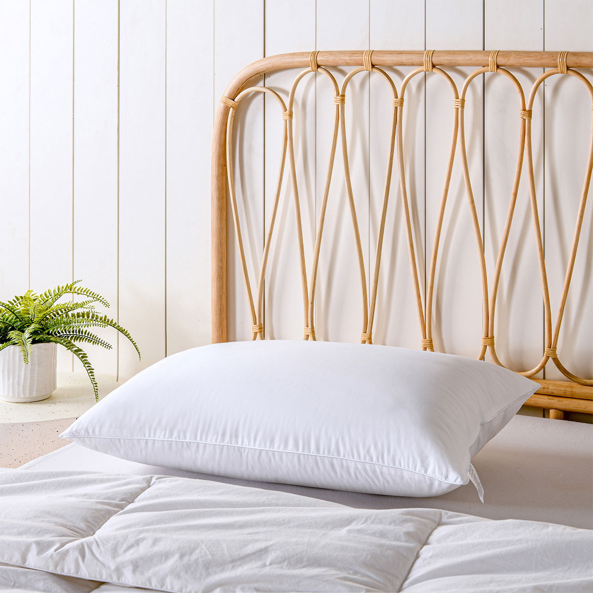 Bianca Natural Sleep white bamboo blend medium profile pillow from Hlpmedical, showing soft, comfortable sleeping pillow for home bedding.