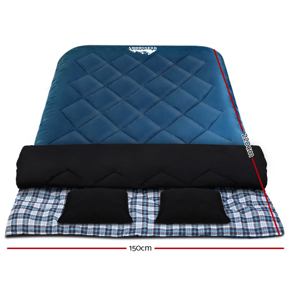 Blue Weisshorn double sleeping bag with pillow, ideal for camping and hiking in cold weather, rated for -10°C thermal insulation.