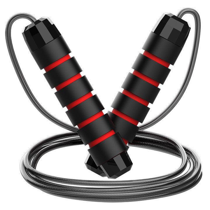 Set of five black and red adjustable steel wire jump ropes with ball bearings for cardio, boxing, and fitness workouts.