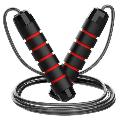 Set of five black and red adjustable steel wire jump ropes with ball bearings for cardio, boxing, and fitness workouts.