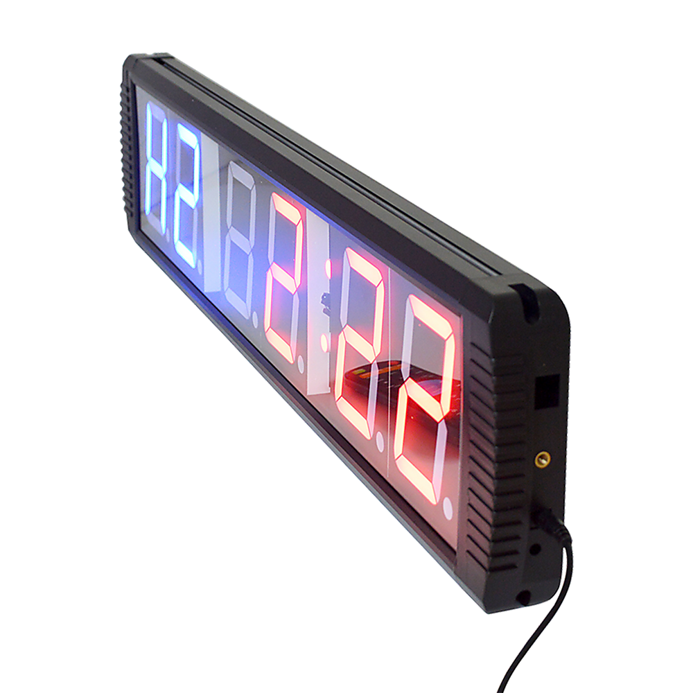 Hlpmedical 6-digit digital timer and LED gym clock for interval training, fitness, and workout timing in a gym setting.