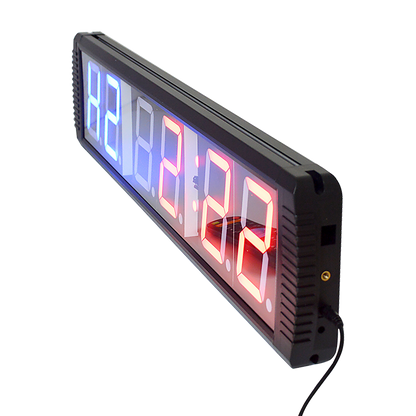 Hlpmedical 6-digit digital timer and LED gym clock for interval training, fitness, and workout timing in a gym setting.