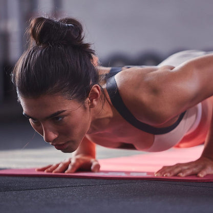 Red Adidas Fitness Mat 7mm for yoga, pilates, judo, and exercise training, designed for gym and fitness workouts.